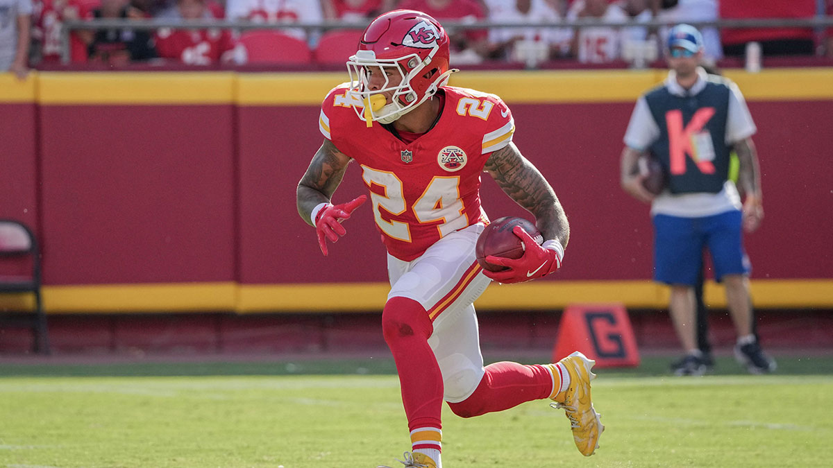Kansas City Chiefs wide receiver Skyy Moore (24) runs the ball against the Detroit Lions during the game at GEHA Field at Arrowhead Stadium