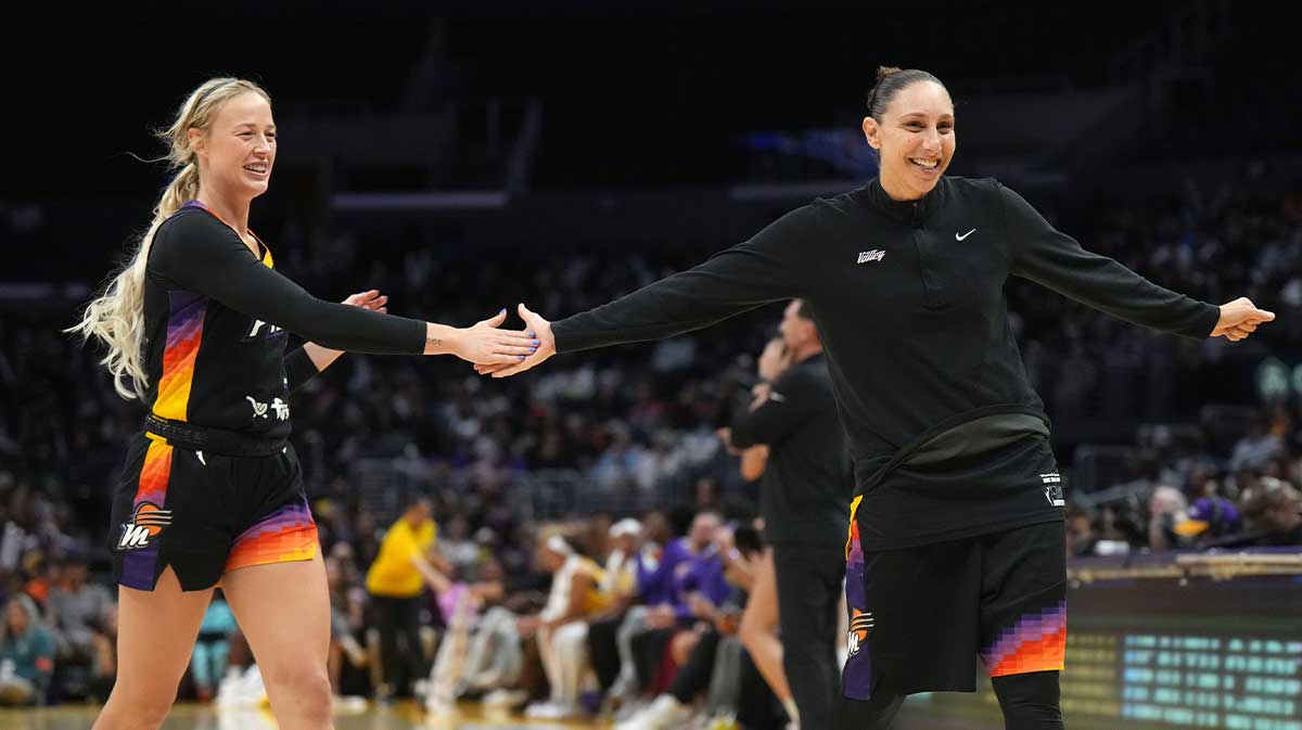 Phoenix Mercury guard Sophie Cunningham (9) and guard Diana Taurasi (3) celebrate in the second half against the LA Sparks at Crypto.com Arena.