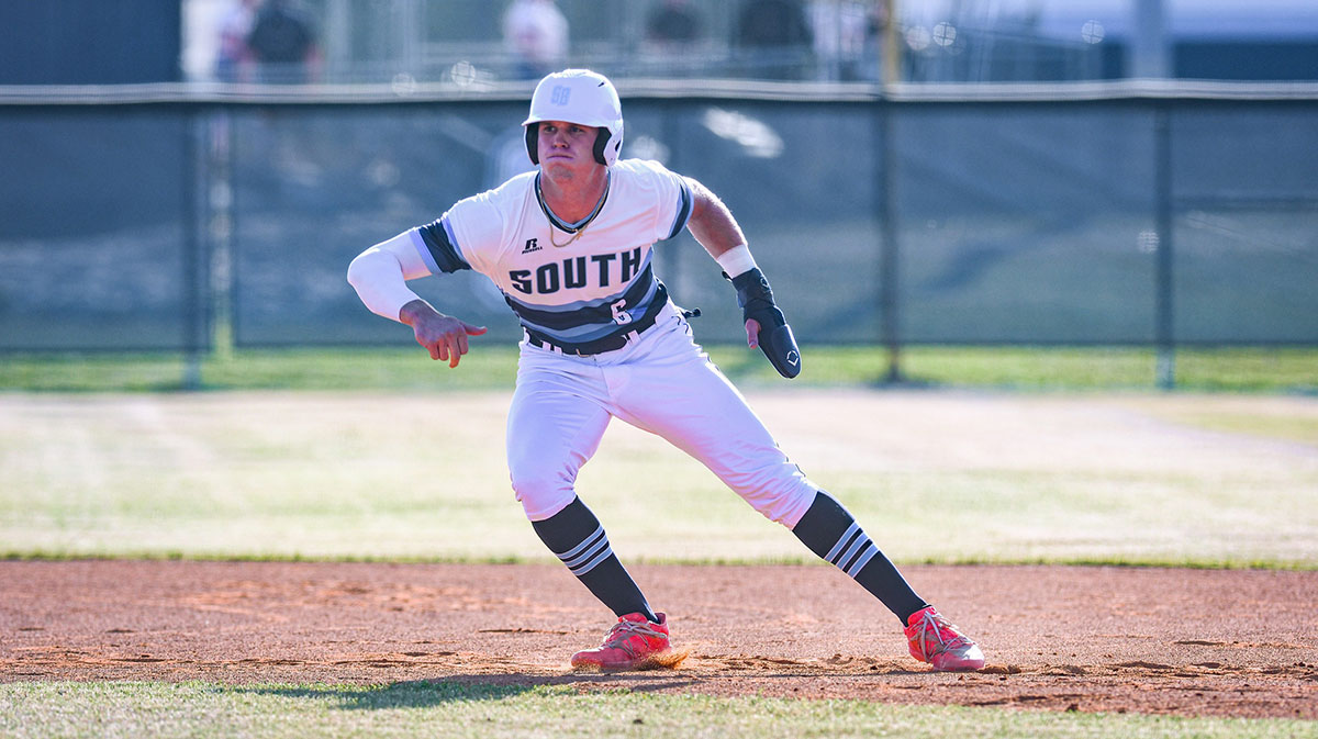 South Brunswick's Walker Jenkins navigates the bases as the Cougars hosted Carrboro in the second round of the NCHSAA 3A state playoffs on Friday, May 12, 2023.