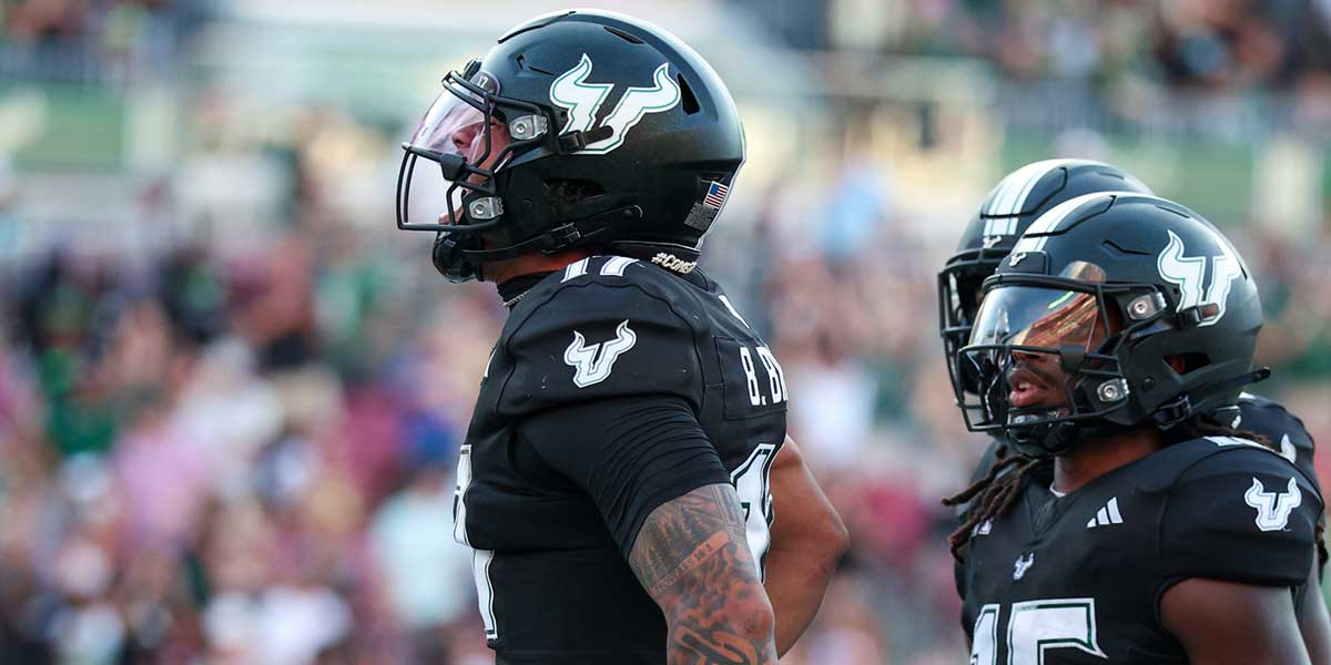 South Florida Bulls quarterback Byrum Brown (17) reacts after scoring a touchdown against the Boise State Broncos in the second quarter at Raymond James Stadium.