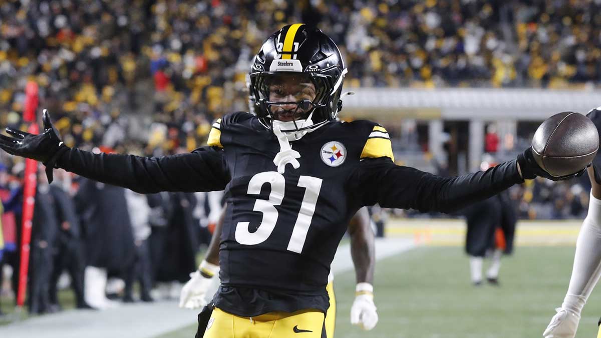 Pittsburgh Steelers cornerback Beanie Bishop Jr. (31) celebrates after intercepting a Cincinnati Bengals pass during the second quarter at Acrisure Stadium.