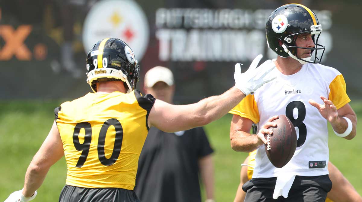 Pittsburgh Steelers defensive end T.J. Watt (90) pressures quarterback Aaron Rodgers (8) during training camp at Saint Vincent College.
