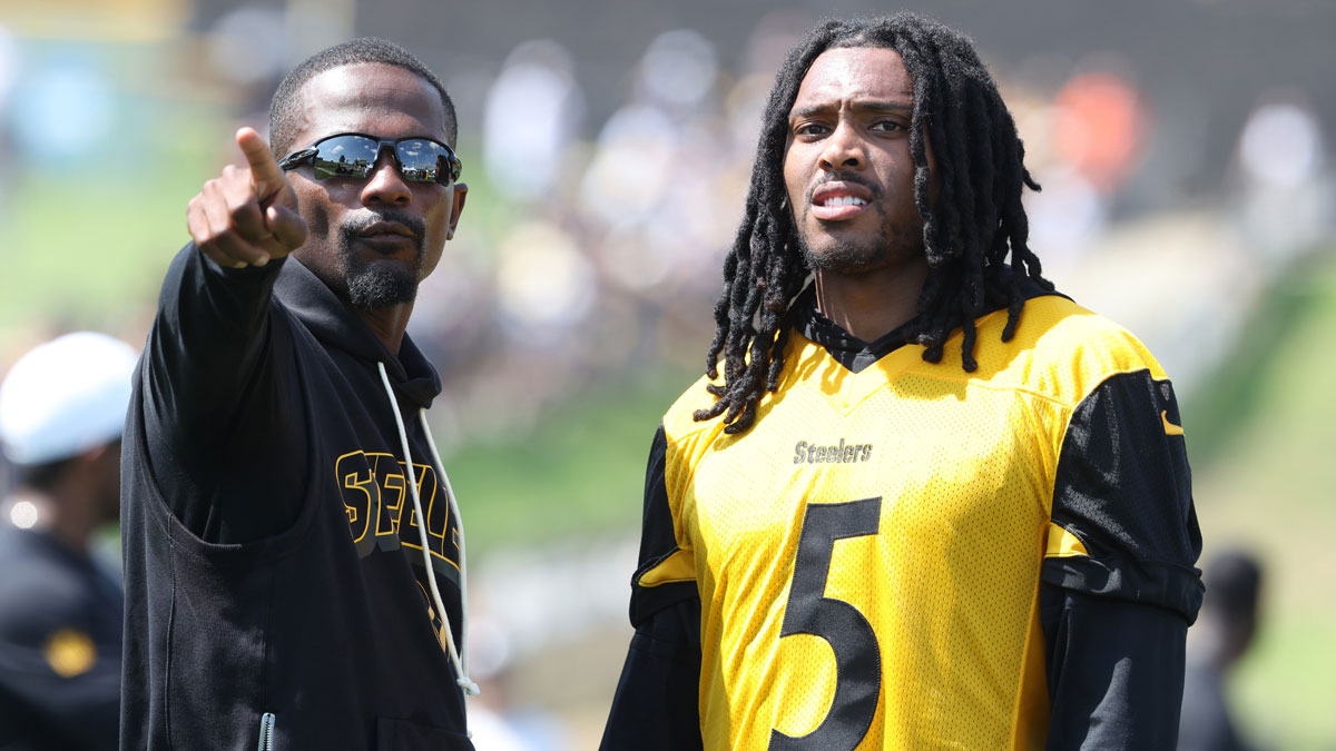 Steelers cornerback Jalen Ramsey (5) participates in drills during training camp at Saint Vincent College Steelers head coach Mike Tomlin in the background