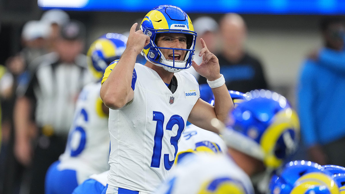 Los Angeles Rams quarterback Stetson Bennett IV (13) gestures in the second half against the Los Angeles Chargers at SoFi Stadium.
