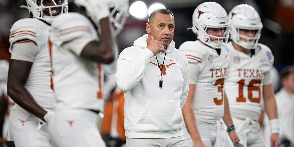Texas Longhorns head coach Steve Sarkisian leads warm ups prior to the Cotton Bowl Classic College Football Playoff semifinal game between the Ohio State Buckeyes and the Texas Longhorns at AT&T Stadium in Arlington, Texas on Jan. 10, 2025.