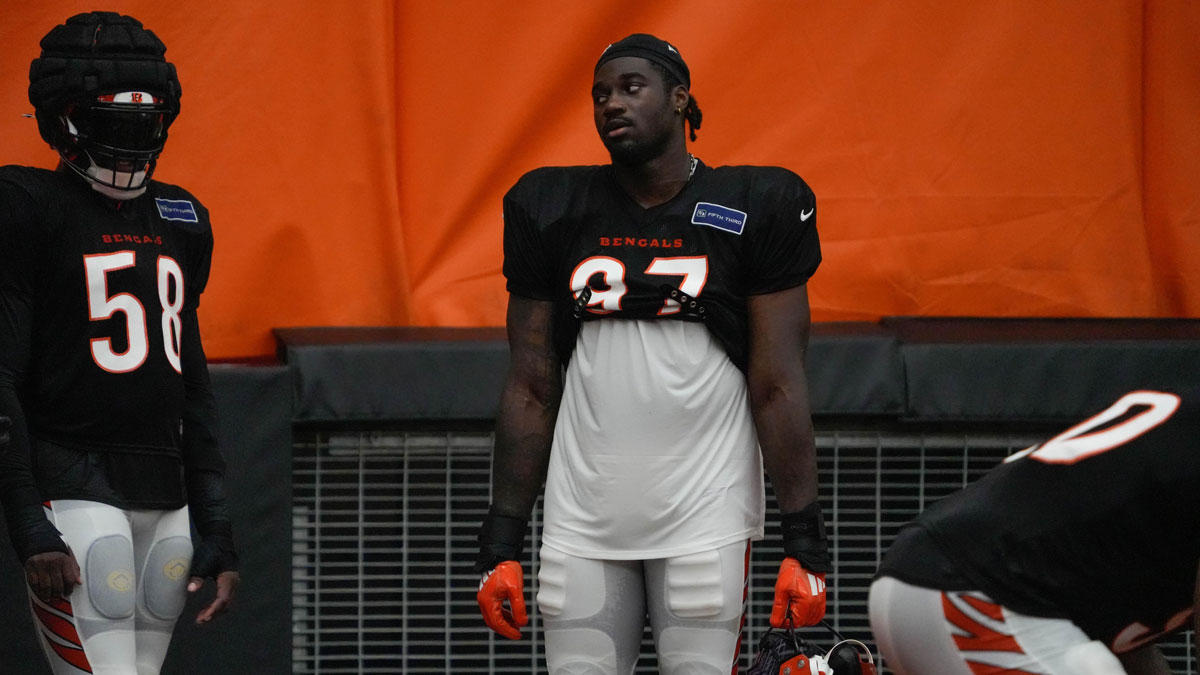 Bengals continue training camp Monday July 28, 2025. Players and coaches ran drills outside on the practice lawn until rain moved the camp to the Bengals' inside practice facility. Bengals Shemar Stewart (97) at camp.