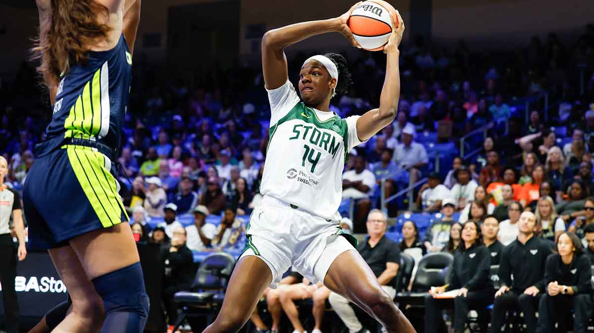 Seattle Storm center Dominique Malonga (14) controls the ball as Dallas Wings forward Maddy Siegrist (20) defends during the first half at College Park Center.