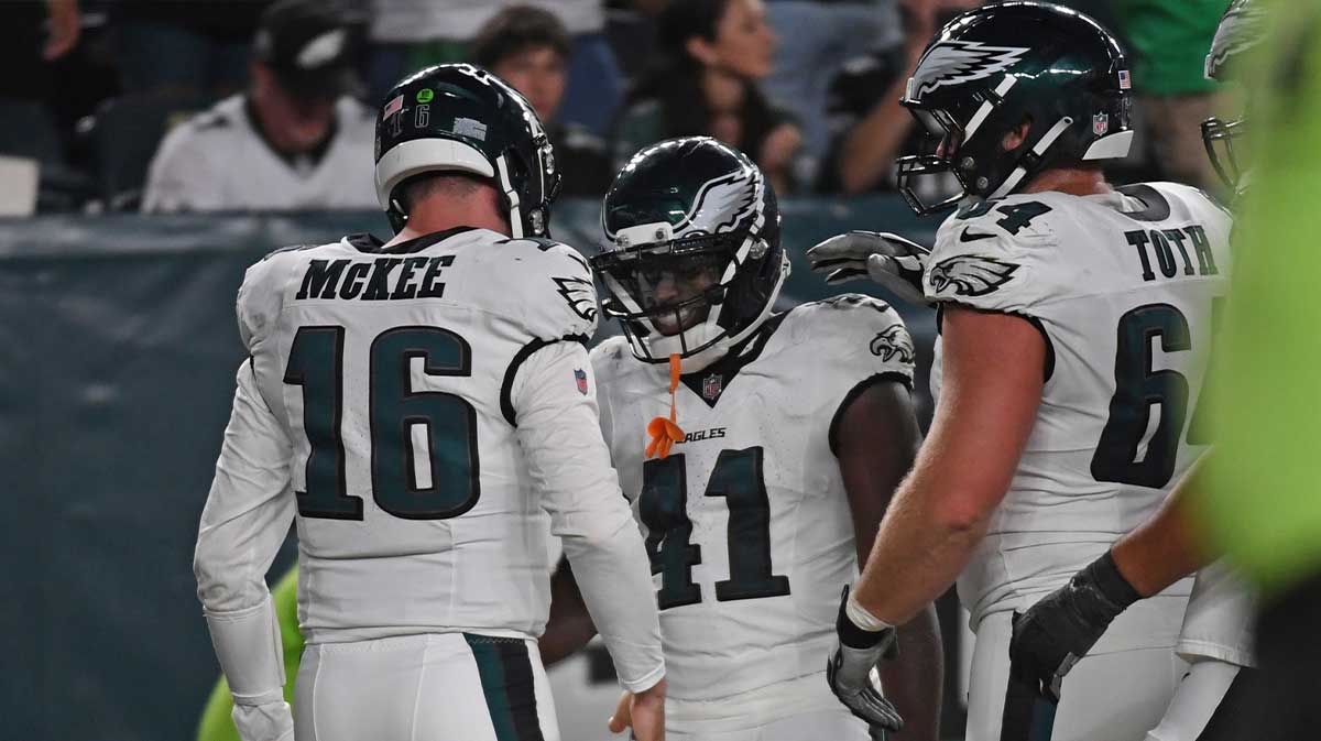 Philadelphia Eagles wide receiver Darius Cooper (41) and quarterback Tanner McKee (16) celebrates a touchdown against the Cincinnati Bengals during the second quarter at Lincoln Financial Field.