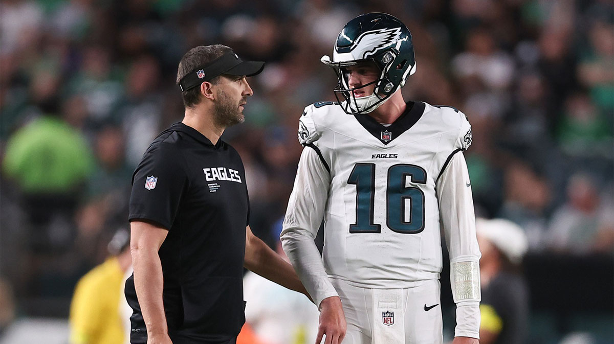 Philadelphia Eagles head coach Nick Sirianni talks with quarterback Tanner McKee (16) in a game against the Cincinnati Bengals at Lincoln Financial Field.