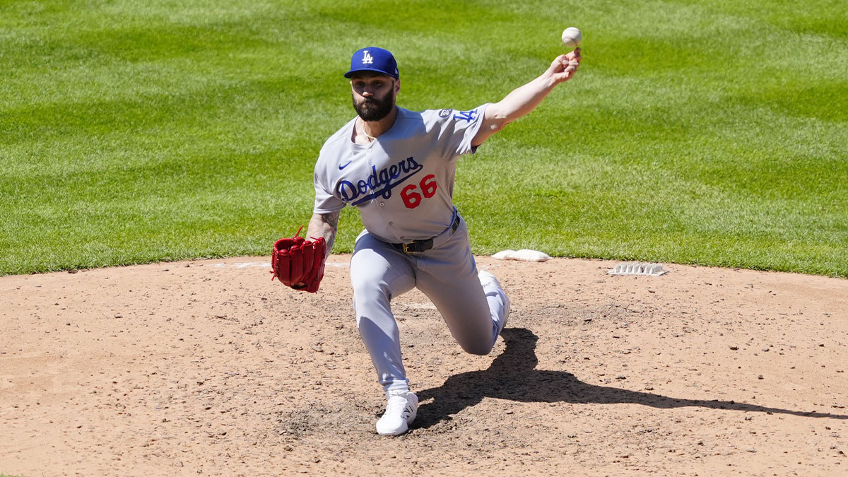 Jun 26, 2025; Denver, Colorado, USA; Los Angeles Dodgers relief pitcher Tanner Scott (66) delivers a pitch in the ninth inning against the Colorado Rockies at Coors Field. 
