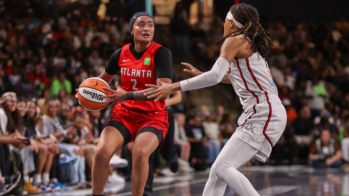 Atlanta Dream guard Te-Hina Paopao (2) is defended by Washington Mystics guard Sug Sutton (1) in the fourth quarter at Gateway Center Arena at College Park.