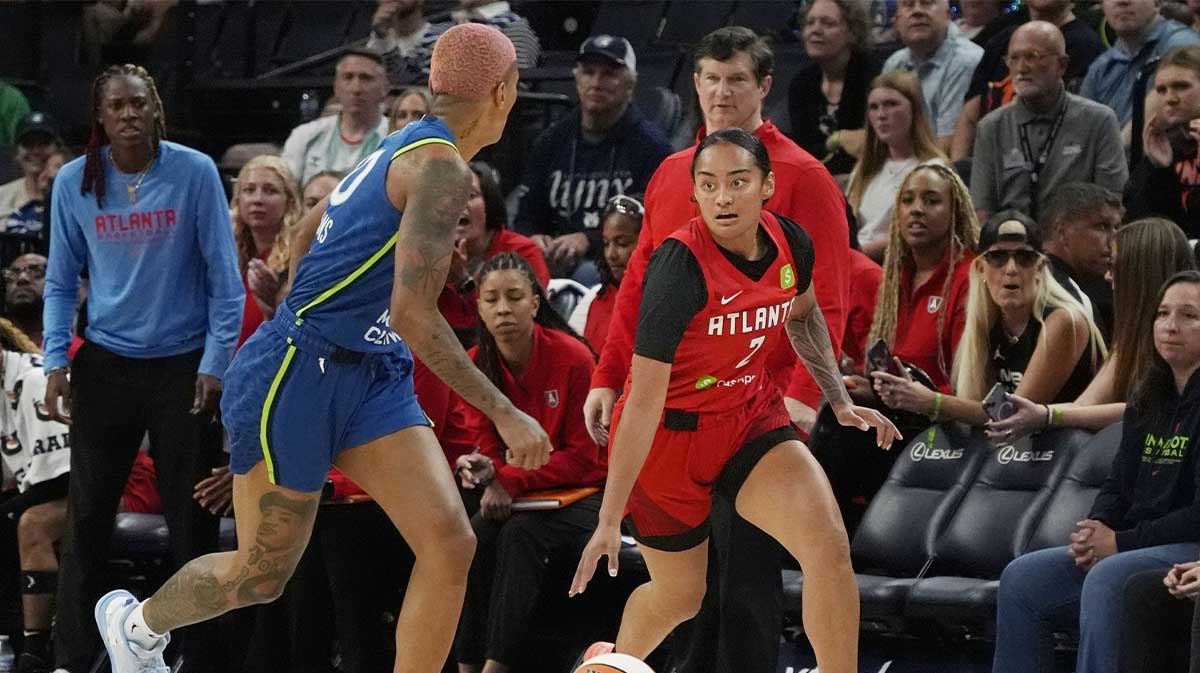 Atlanta Dream guard Te-Hina Paopao (2) dribbles up court against Minnesota Lynx guard Courtney Williams (10) in the first quarter at Target Center.