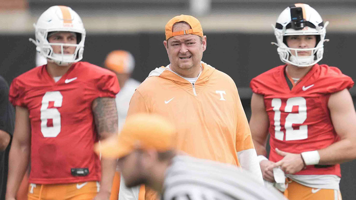 Tennessee quarterback Joey Aguilar (6) Tennessee head coach Josh Heupel and Tennessee quarterback Jake Merklinger (12) during Tennessee football preseason practice, in Knoxville, Tennessee, July 31, 2025.