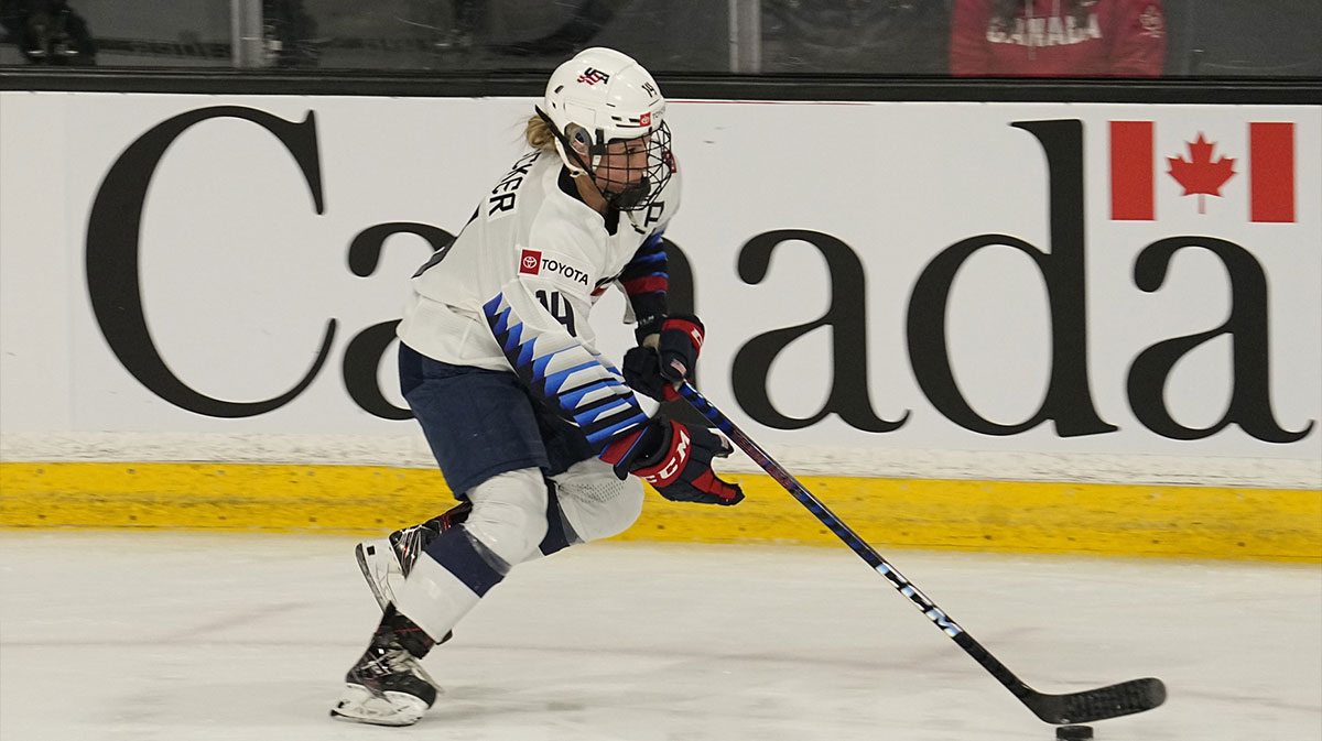 Nov 21, 2021; Kingston, Ontario, CAN; USA forward Brianna Decker (14) shoots the puck during the warm up of a Rivalry Series women's hockey game against Canada at Leon's Centre. Mandatory Credit: John E. Sokolowski-Imagn Images