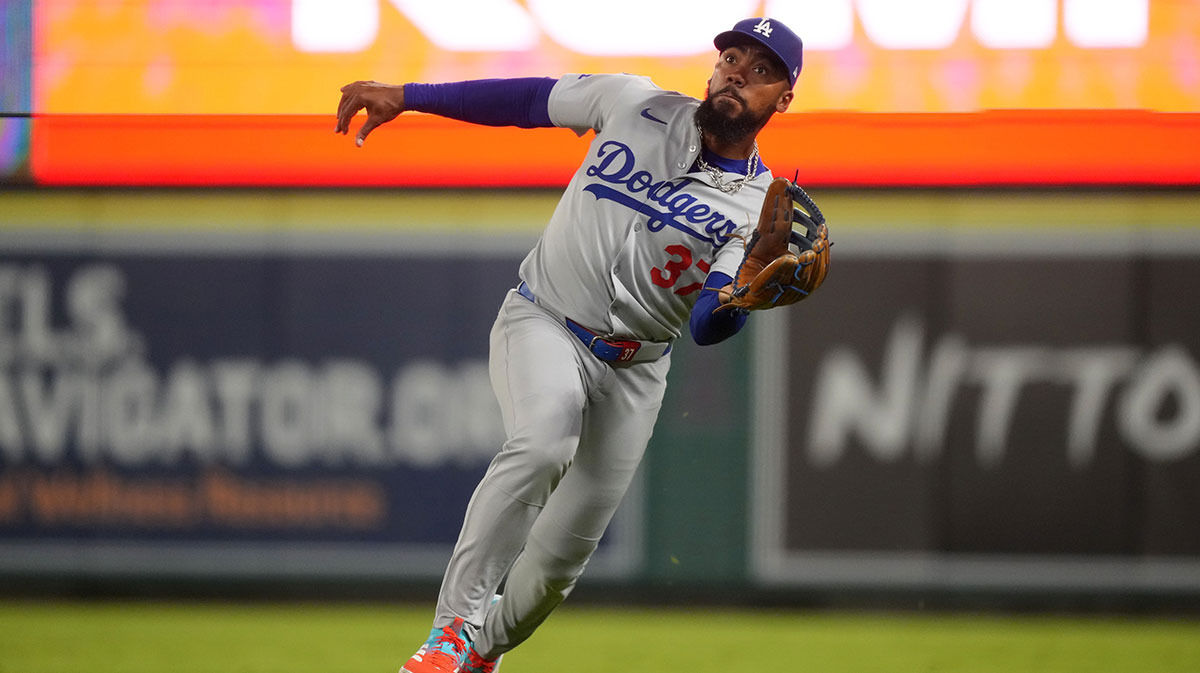 Los Angeles Dodgers right fielder Teoscar Hernandez (37) catches a fly ball in the seventh inning against the Los Angeles Angels at Angel Stadium.