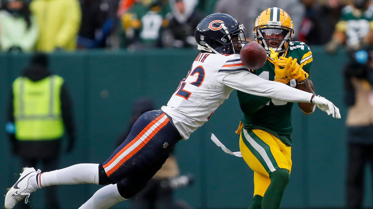 Chicago Bears cornerback Terell Smith (32) breaks up a pass intended for Green Bay Packers wide receiver Dontayvion Wicks (13) on Sunday, January 5, 2025, at Lambeau Field in Green Bay, Wis. The Bears won the game, 24-22, on a 51-yard field goal as time expired. Tork Mason/USA TODAY NETWORK-Wisconsin