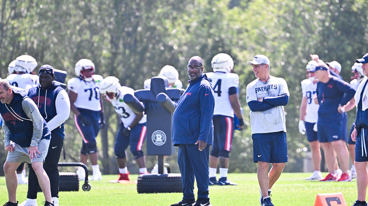 New England Patriots defensive coordinator Terrell Williams watches over practice during training camp at Gillette Stadium.