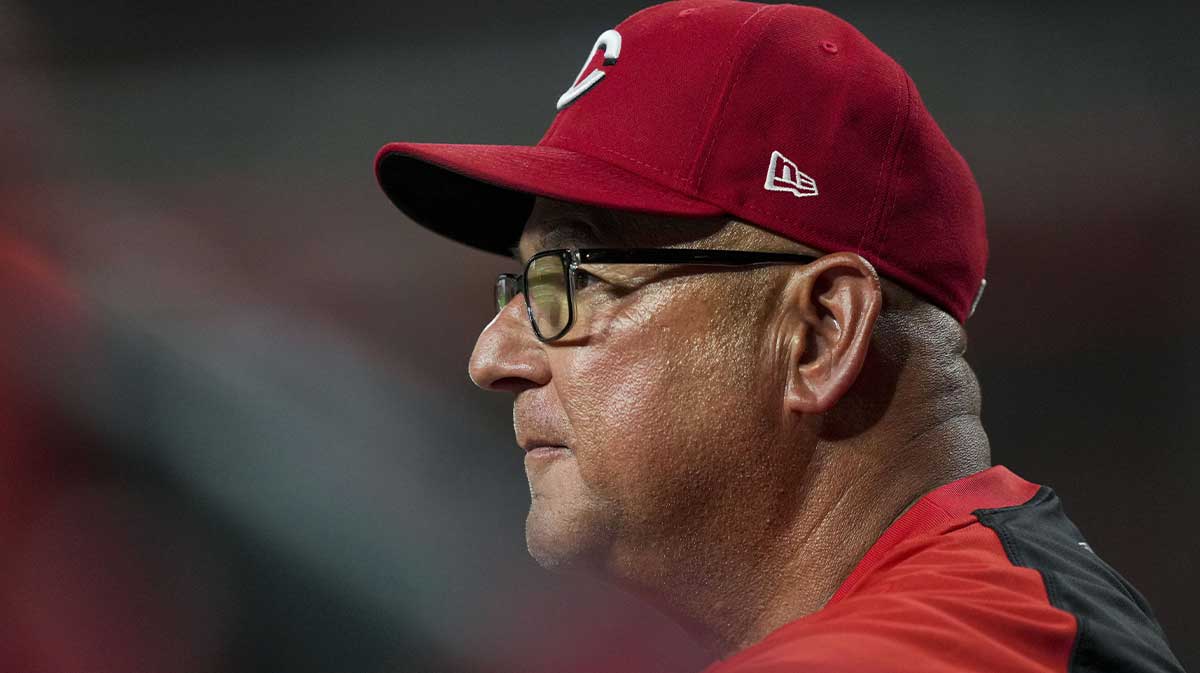 Cincinnati Reds manager Terry Francona (77) watches from the dugout during the game against the Los Angeles Dodgers in the eighth inning at Great American Ball Park