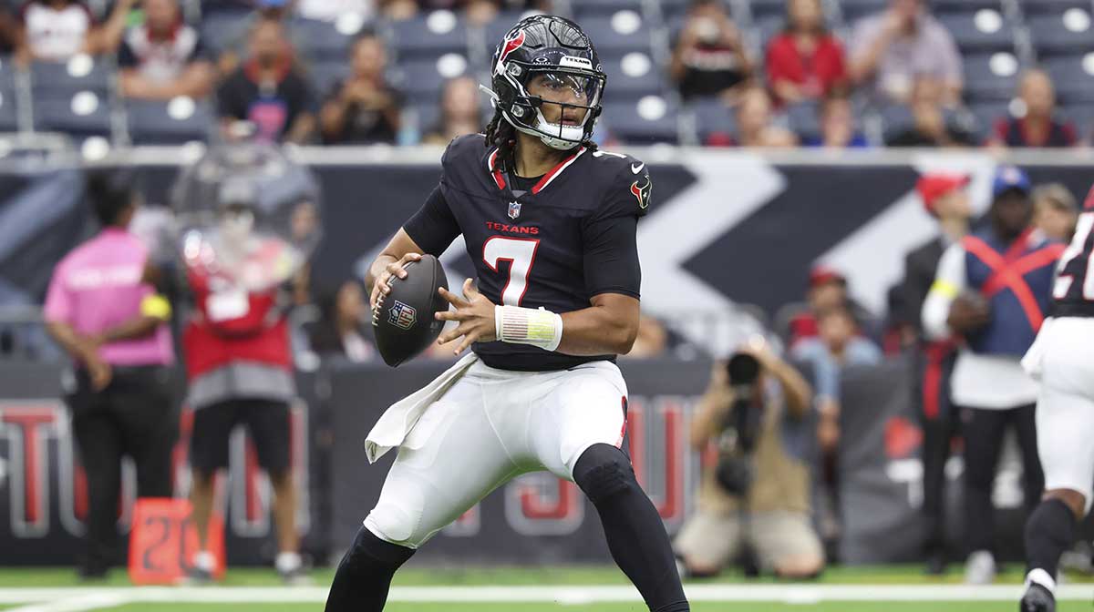 Houston Texans quarterback C.J. Stroud (7) looks for an open receiver during the first quarter against the Carolina Panthers at NRG Stadium.