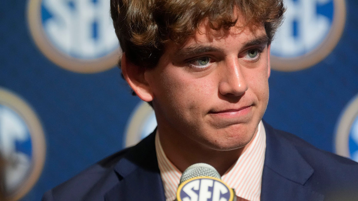 Texas quarterback Arch Manning listens to a question during SEC Media Days.