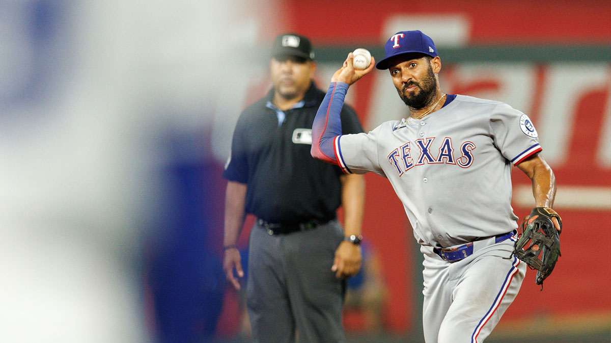 Texas Rangers second base Marcus Semien (2) throws to first base during the ninth inning against the Kansas City Royals at Kauffman Stadium.