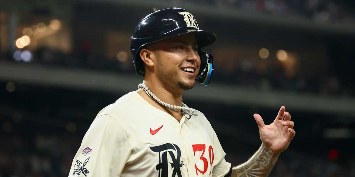 Texas Rangers pinch runner Cody Freeman (39) reacts after scoring during the eighth inning against the Detroit Tigers at Globe Life Field.