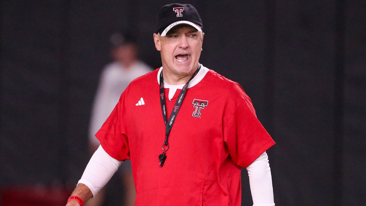 Texas Tech head coach Head coach Joey McGuire walks the field during Texas Tech football practice, Monday, August 11, 2025, at the Womble Football Center with Texas Tech center Cash Cleveland