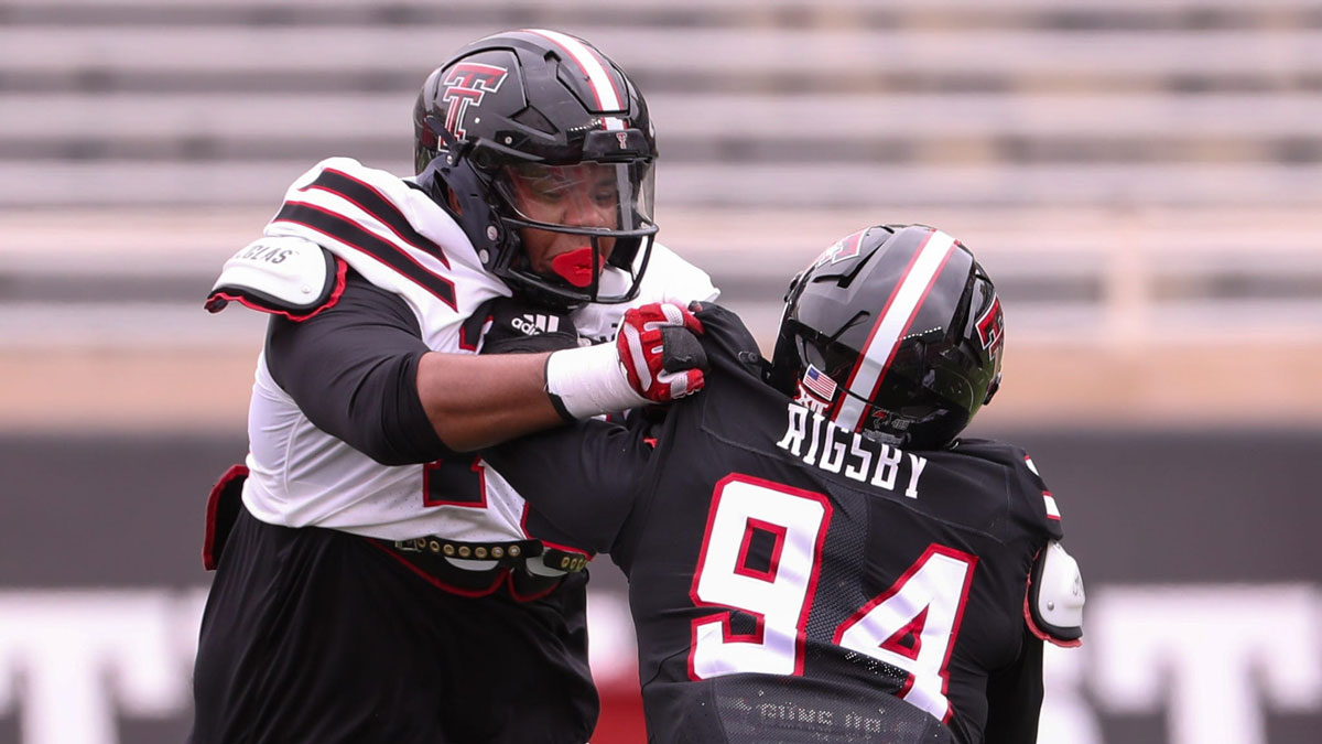 Howard Sampson blocks Braylon Rigsby (94) during the Texas Tech football team's spring game, Saturday, April 19, 2025, at Jones AT&T Stadium.