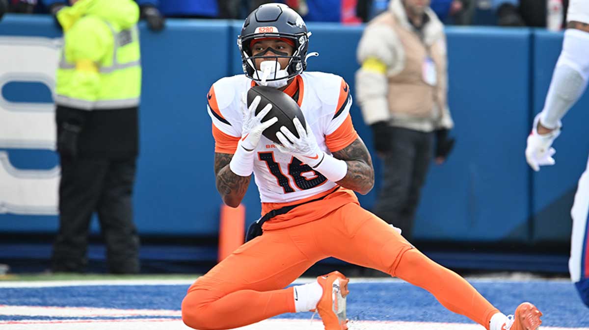 Denver Broncos wide receiver Troy Franklin (16) catches a touchdown pass against the Buffalo Bills during the first quarter in an AFC wild card game at Highmark Stadium.