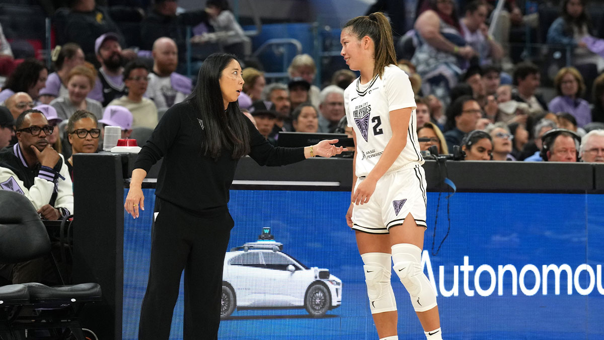 Golden State Valkyries head coach Natalie Nakase (left) talks with guard Kaitlyn Chen (2) during the second quarter against the Connecticut Sun at Chase Center. 