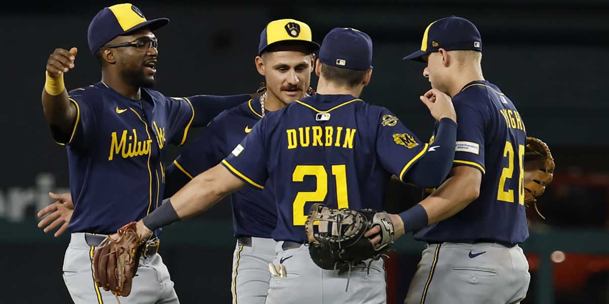 The Milwaukee Brewers infield celebrates after their game against the Washington Nationals at Nationals Park.