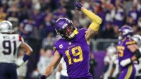Minnesota Vikings wide receiver Adam Thielen (19) celebrates his touchdown against the New England Patriots during the fourth quarter at U.S. Bank Stadium.