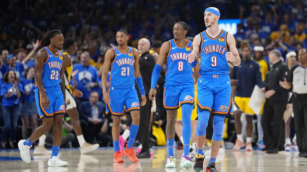Thunder guard Alex Caruso (9) reacts after a play against the Indiana Pacers during the second half of game seven of the 2025 NBA Finals at Paycom Center with NBA's Sixth Man of The Year in the background