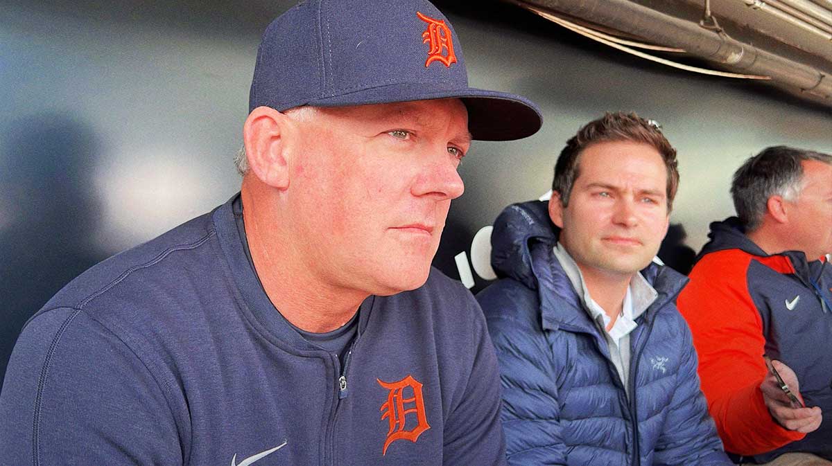 Detroit Tigers manager A.J. Hinch, left, and president of baseball operations Scott Harris, right, talk with reporters March 27, 2024, at Guaranteed Rate Field in Chicago.