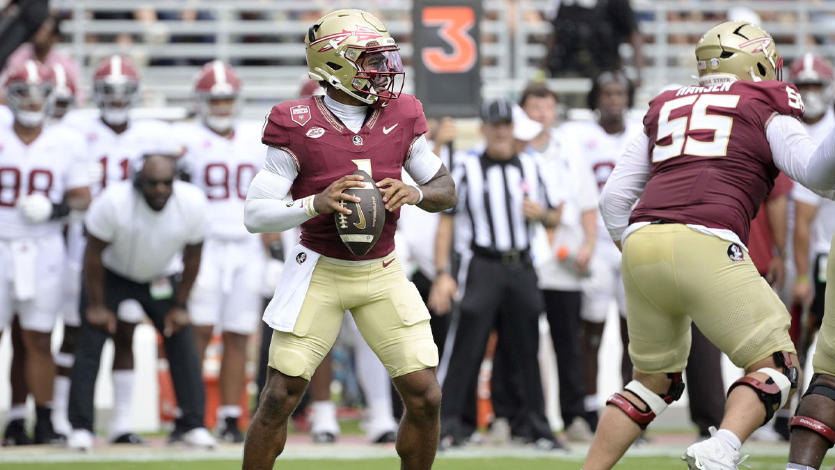 Florida State Seminoles quarterback Tommy Castellanos (1) looks to pass the ball against the Alabama Crimson Tide during the first half at Doak S. Campbell Stadium.