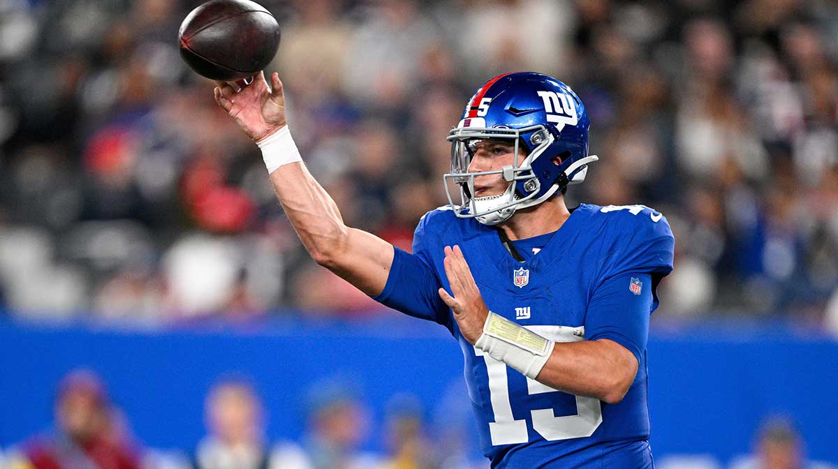 New York Giants quarterback Tommy DeVito (15) throws the ball during the third quarter against the New England Patriots at MetLife Stadium.
