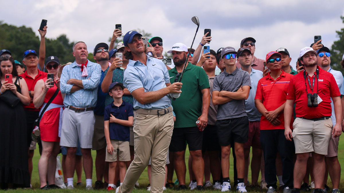 Tommy Fleetwood plays his shot on the fifth hole during the final round of the TOUR Championship golf tournament