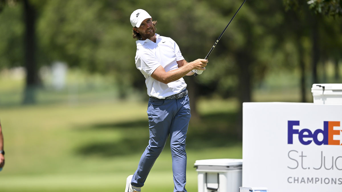 Tommy Fleetwood plays his shot from the fifth tee during the final round of the FedEx St. Jude Championship golf. 