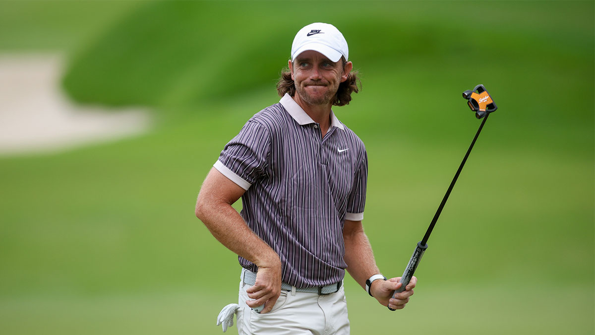 Tommy Fleetwood reacts to the crowd on the 18th green during the third round of the TOUR Championship golf tournament.