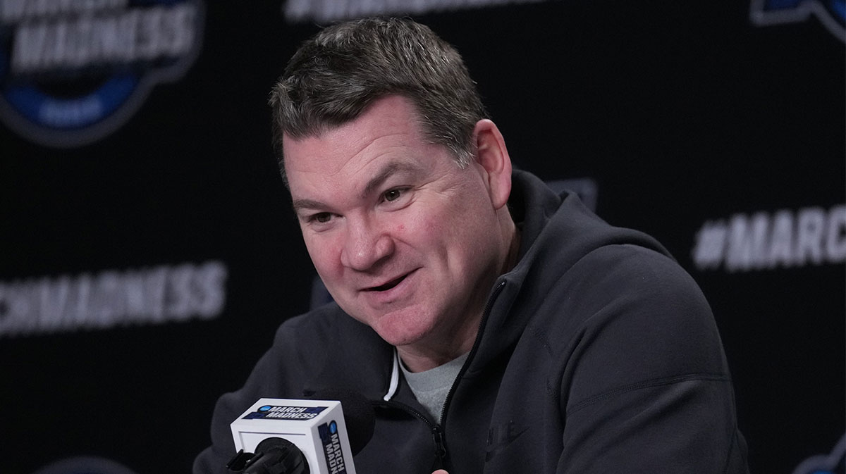 Arizona Wildcats head coach Tommy Lloyd talks to the media at the Prudential Center.