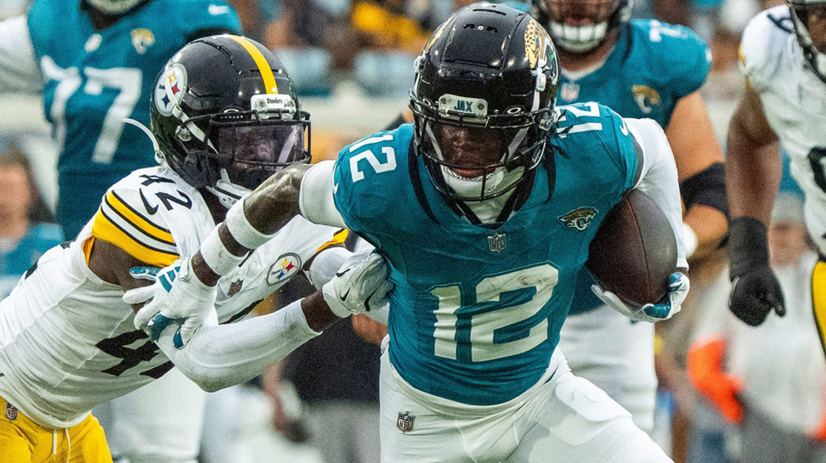Jacksonville Jaguars wide receiver Travis Hunter (12) sheds Pittsburgh Steelers cornerback James Pierre (42) during the first half of the first preseason game where the Jacksonville Jaguars hosted the Pittsburgh Steelers Saturday Aug. 9, 2025, at EverBank Stadium in Jacksonville, Fla
