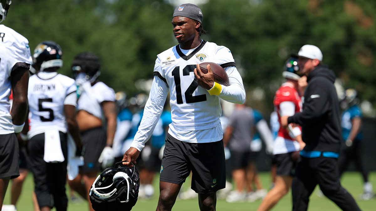 Jacksonville Jaguars wide receiver Travis Hunter (12) looks on during an NFL training camp session at the Miller Electric Center