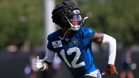 Jacksonville Jaguars wide receiver Travis Hunter (12) runs after an NFL training camp session at the Miller Electric Center