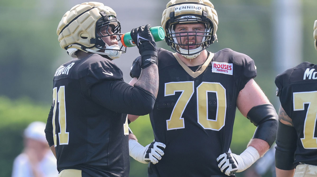  New Orleans Saints offensive tackle Trevor Penning (70) looks on at Ochsner Sports Performance Center.