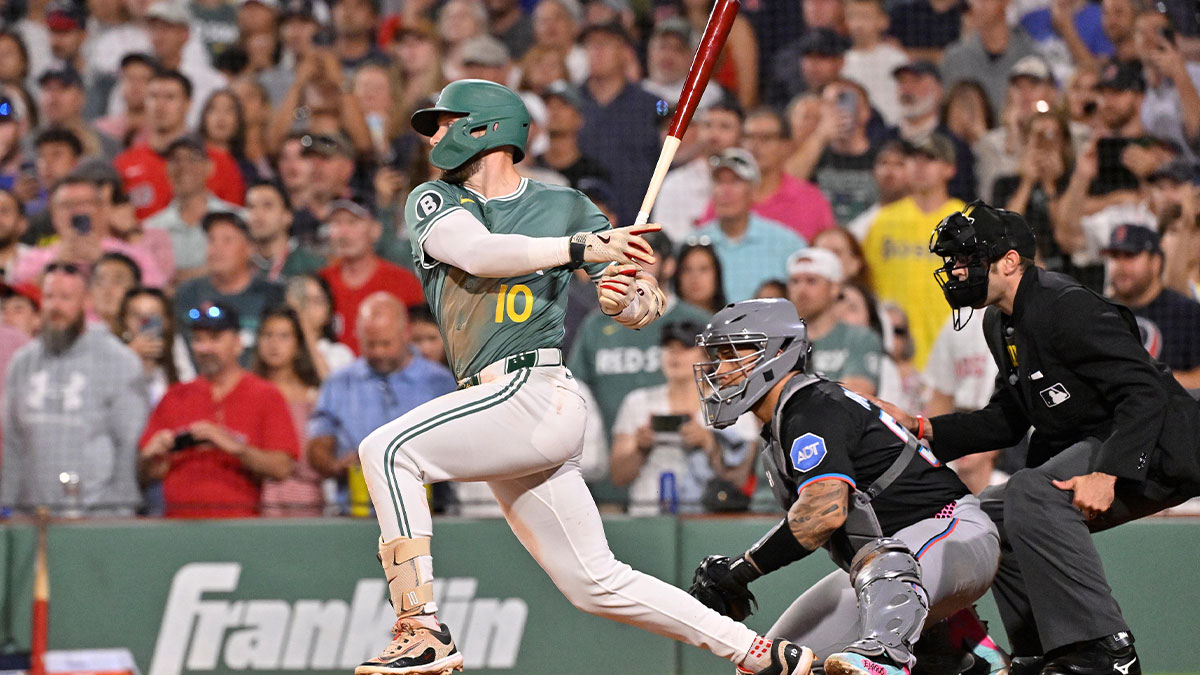 Boston Red Sox shortstop Trevor Story (10) hits a walk-off RBI against the Miami Marlins during the ninth inning at Fenway Park.