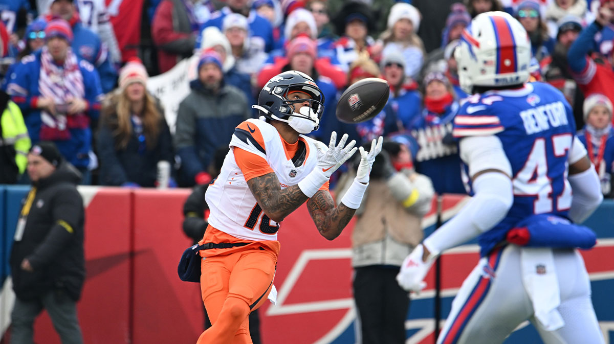 Denver Broncos wide receiver Troy Franklin (16) catches a touchdown pass against the Buffalo Bills during the first quarter in an AFC wild card game at Highmark Stadium.