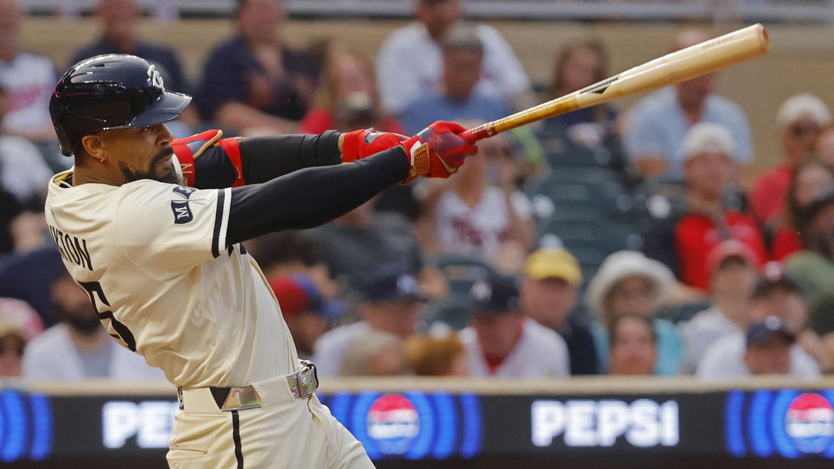 Minnesota Twins center fielder Byron Buxton (25) hits a sacrifice fly against the Washington Nationals in the fifth inning at Target Field.