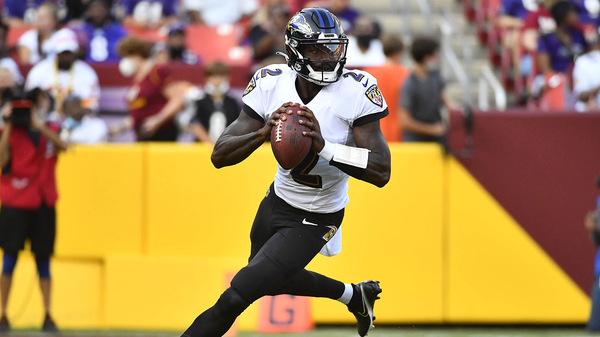 Baltimore Ravens quarterback Tyler Huntley (2) rolls out against the Washington Football Team during the first quarter at FedExField.