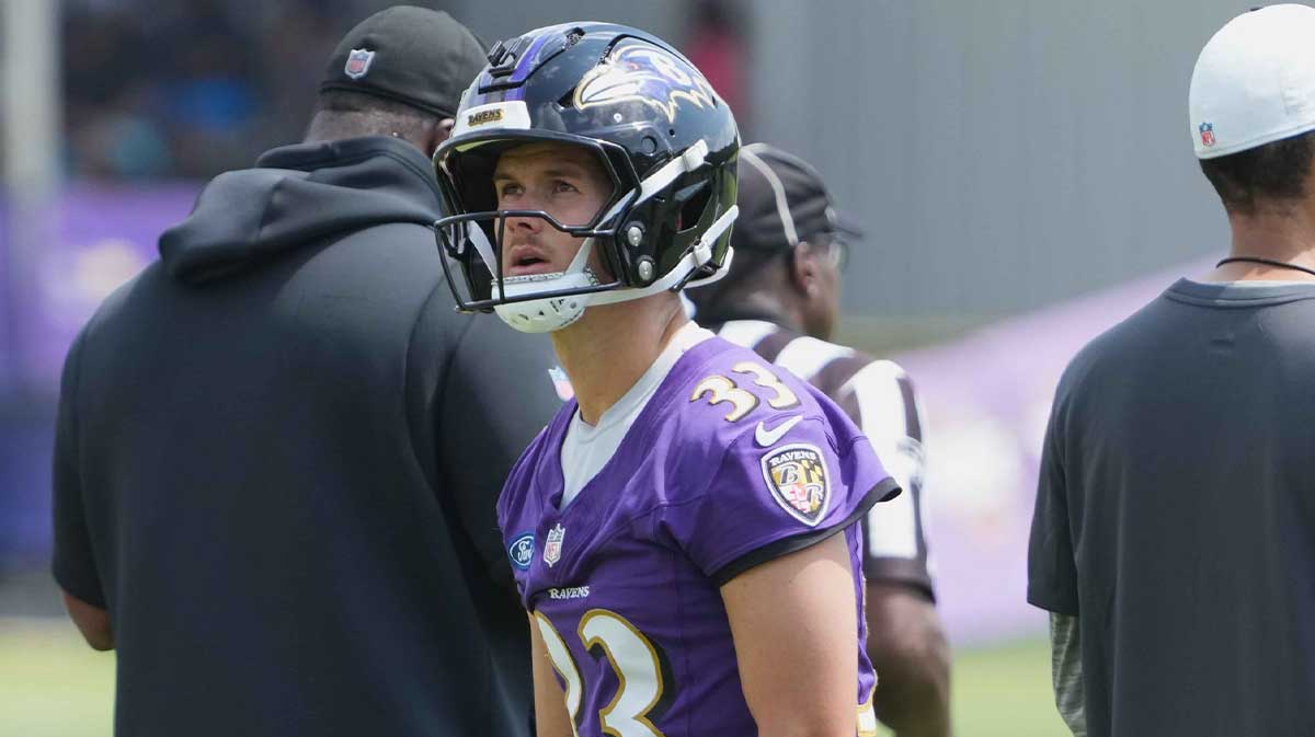Baltimore Ravens kicker Tyler Loop (33) warms up during training camp