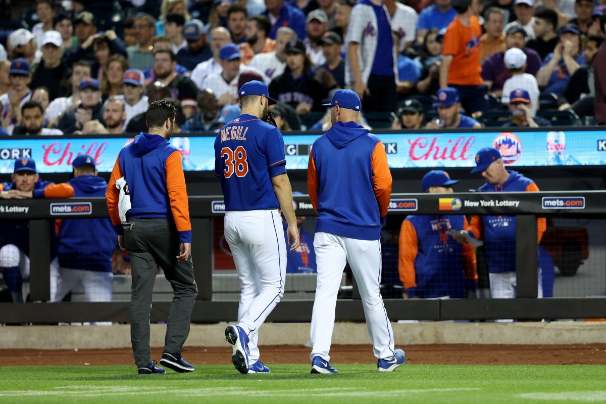 New York Mets starting pitcher Tylor Megill (38) leaves the game with an apparent injury during the fourth inning against the Milwaukee Brewers at Citi Field.
